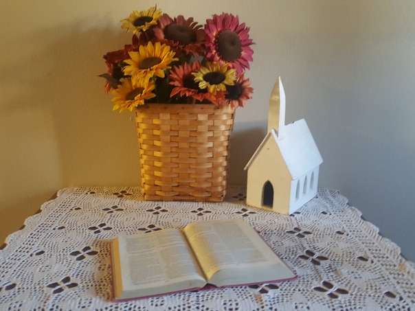 entry way table with open bible